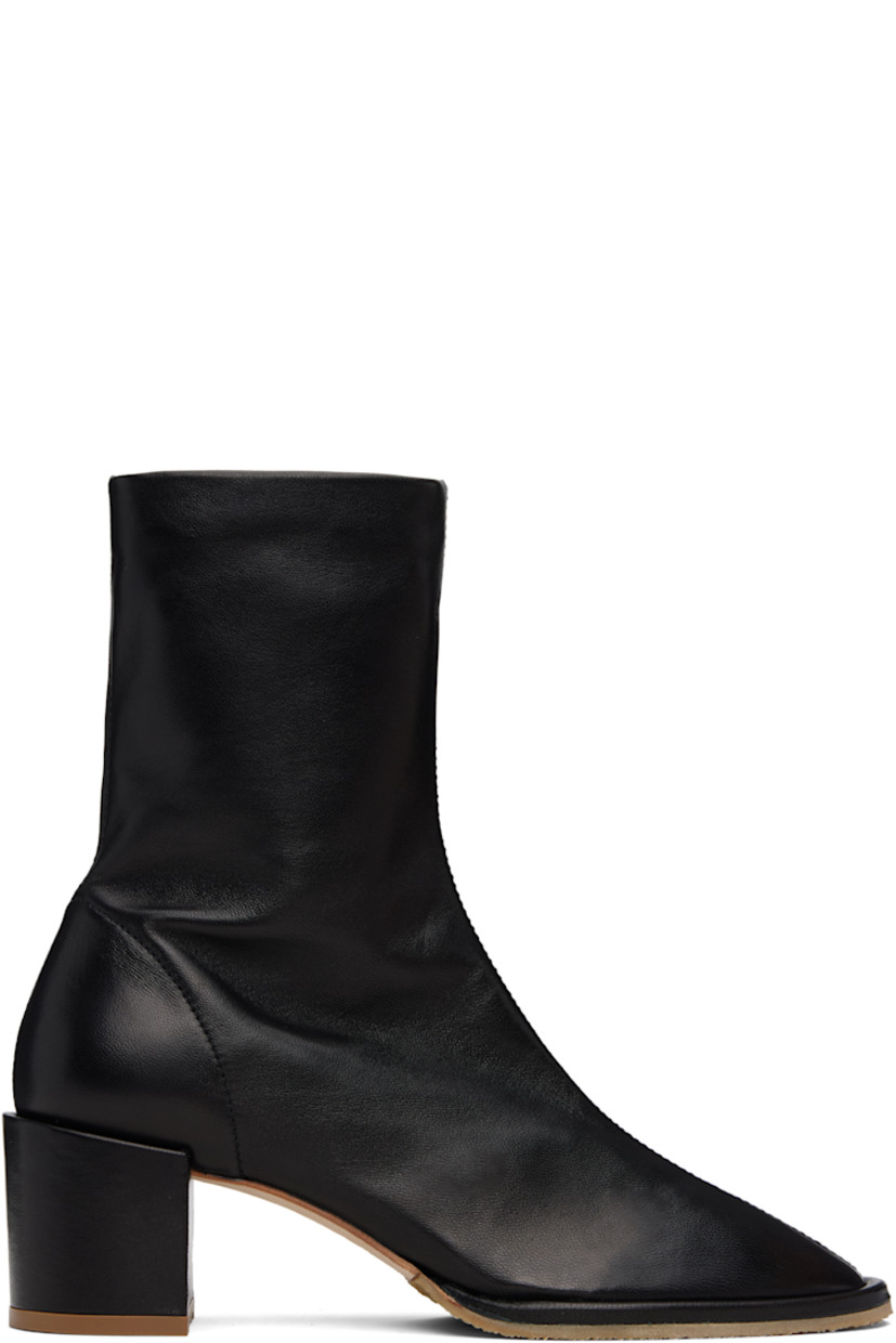 Ankle-high grained nappa lambskin boots. 

· Central seam at vamp
· Zip closure at inner side 
· Suede lining
· Covered block heel with rubber injection
· Nubuck and crêpe-rubber sole
· Heel: H2.25"

Supplier color: Black
