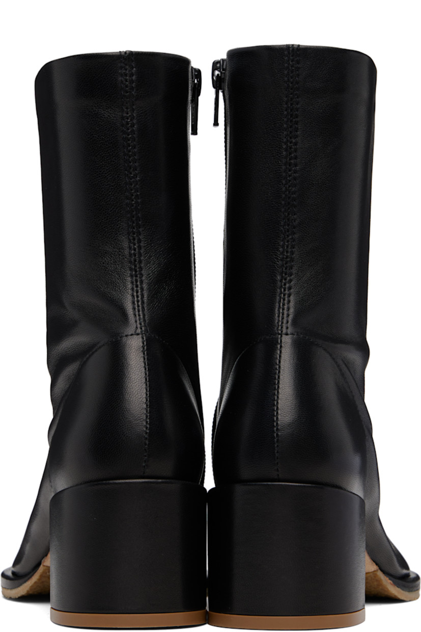 Ankle-high grained nappa lambskin boots. 

· Central seam at vamp
· Zip closure at inner side 
· Suede lining
· Covered block heel with rubber injection
· Nubuck and crêpe-rubber sole
· Heel: H2.25"

Supplier color: Black
