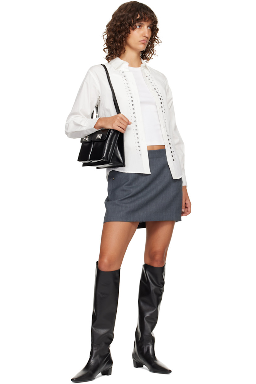 Knee-high grained nappa leather boots.

· Pointed toe
· Leather lining
· Leather sole
· Leather block heel with rubber injection
· Heel: H1.25"

Supplier color: Black