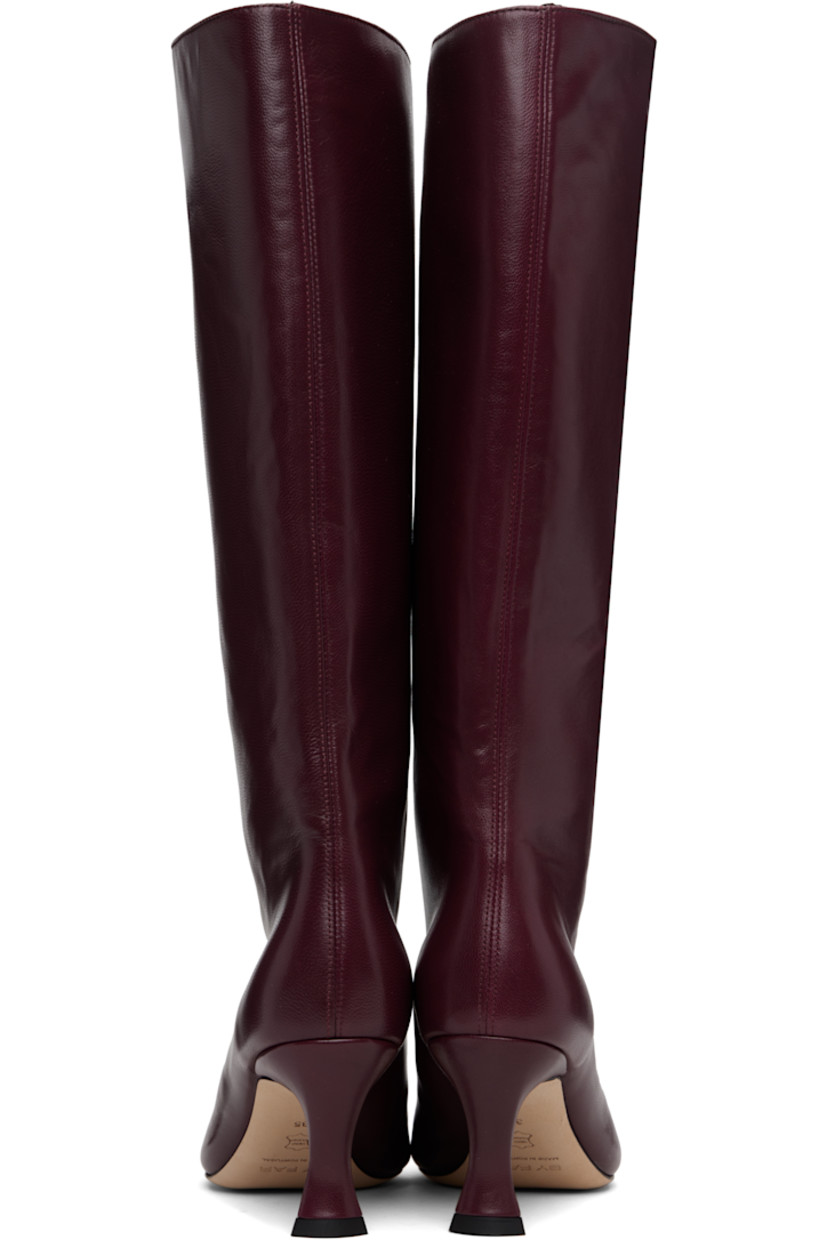 Knee-high grained nappa lambskin boots.

· Pointed toe
· Grained leather lining
· Covered stiletto heel with rubber injection
· Nubuck sole
· Heel: H2.75"

Supplier color: Sour cherry