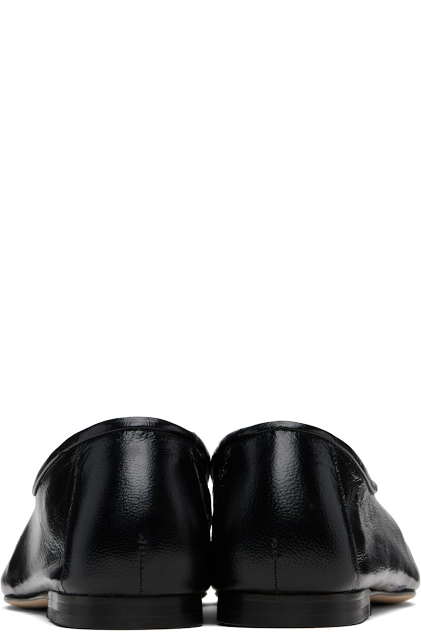 Crinkled polished lambskin ballerina flats.

· LWG-certified lambskin
· Central seam at vamp
· Suede interior
· Leather sole with rubber heel

Supplier color: Black