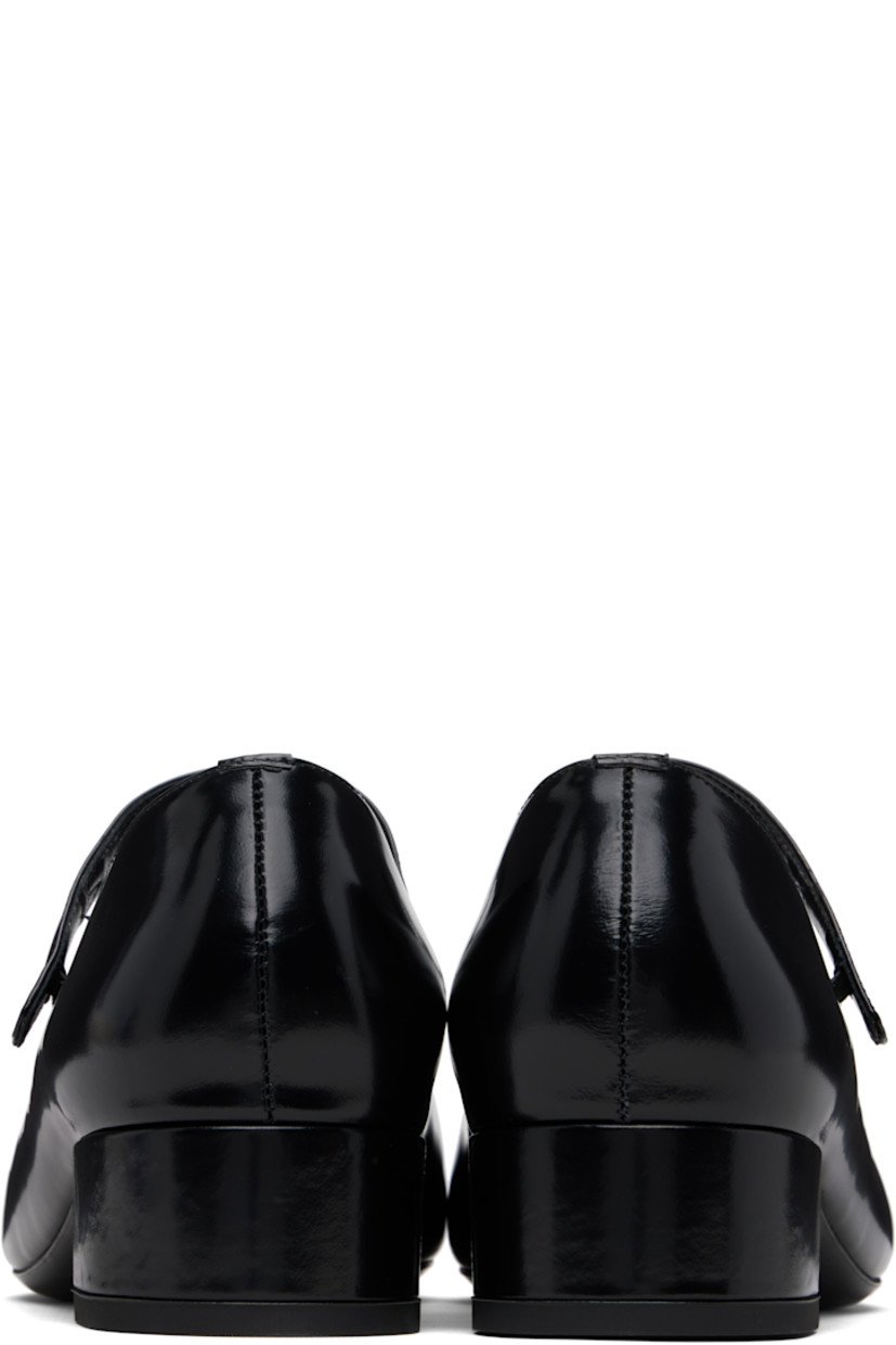 Polished leather Mary Jane-style heels.

· LWG-certified leather
· Square toe
· Elasticized strap at vamp
· Covered block heel with rubber injection
· Leather sole
· Heel: H1.25"

Supplier color: Black