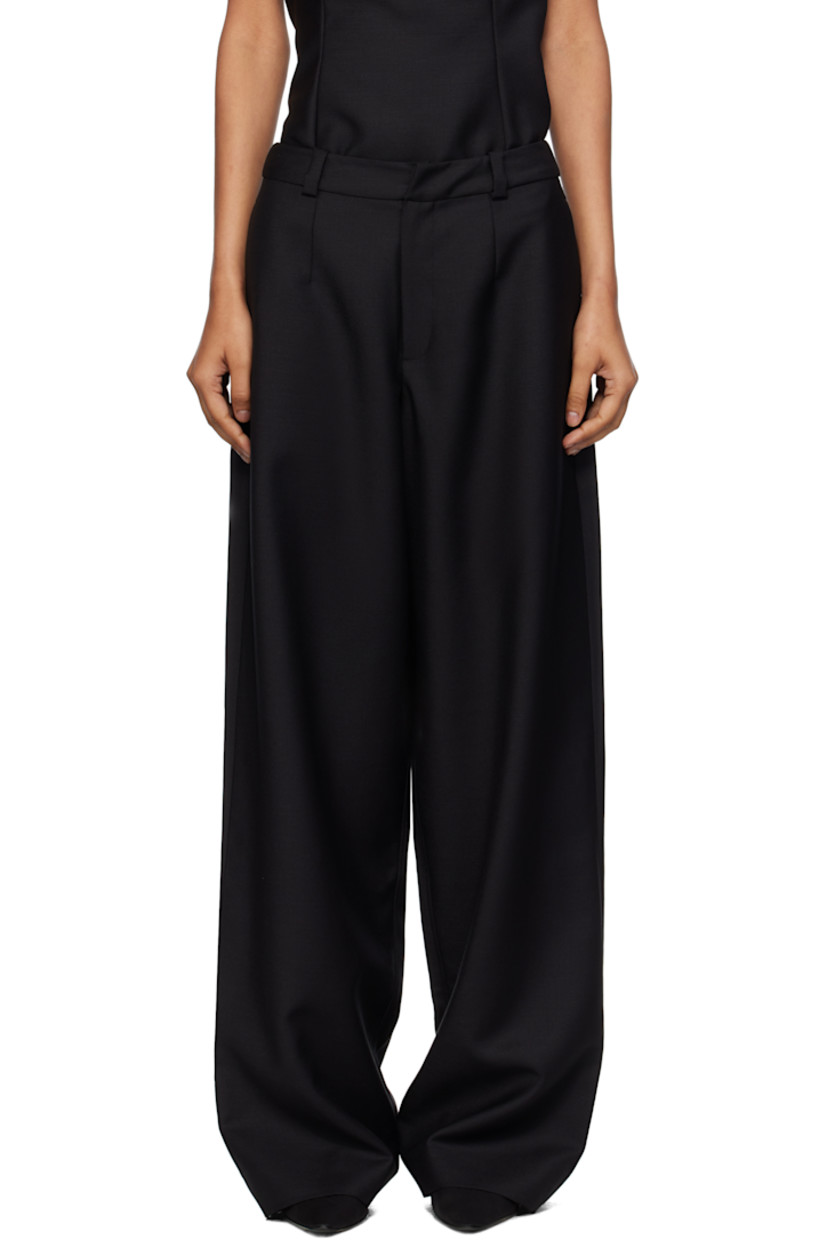 Plain-woven mohair- and wool-blend trousers. 

· Loose-fit
�· Mid-rise
· Belt loops
· Three-pocket styling
· Zip fly
· Darts at front and back

Supplier color: Black