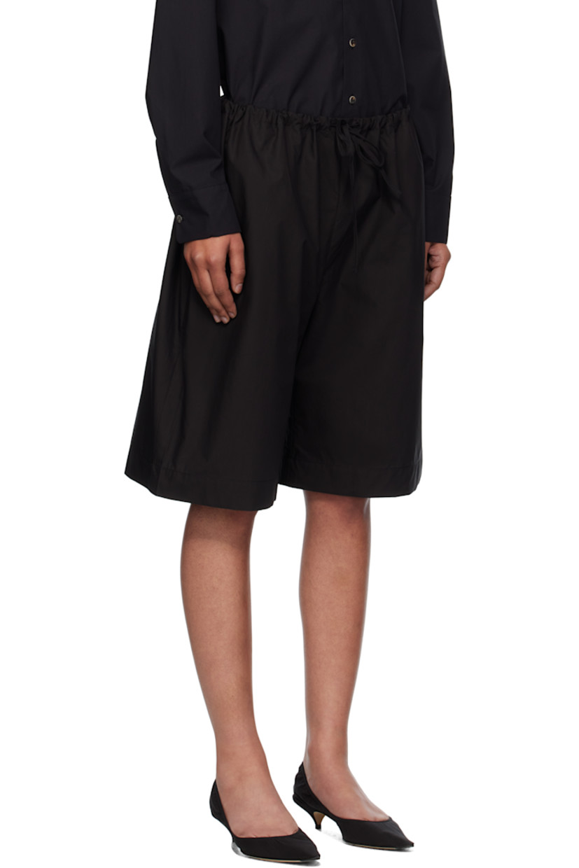 Deadstock cotton poplin shorts. 

· Loose-fit
· Self-tie drawstring at waistband
· Three-pocket styling

Supplier color: Black