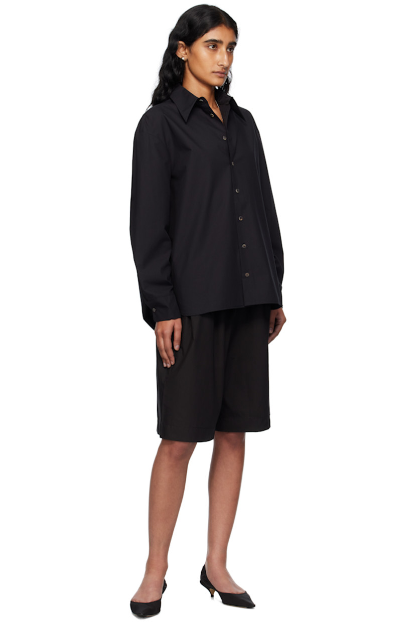Deadstock cotton poplin shorts. 

· Loose-fit
· Self-tie drawstring at waistband
· Three-pocket styling

Supplier color: Black