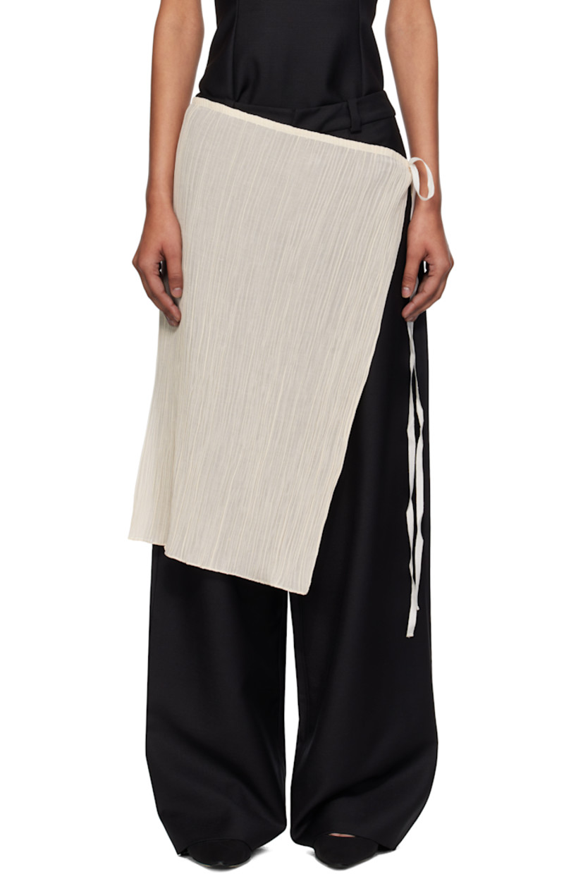 Garment-pleated plain-woven cotton- and silk-blend midi skirt.

· Semi-sheer
· Wrap construction
· Self-tie fastening at side seam
· Unlined

Supplier color: Bone
