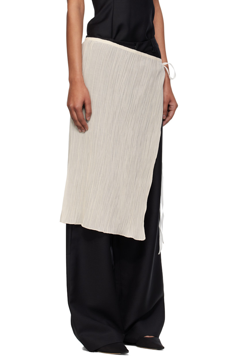 Garment-pleated plain-woven cotton- and silk-blend midi skirt.

· Semi-sheer
· Wrap construction
· Self-tie fastening at side seam
· Unlined

Supplier color: Bone