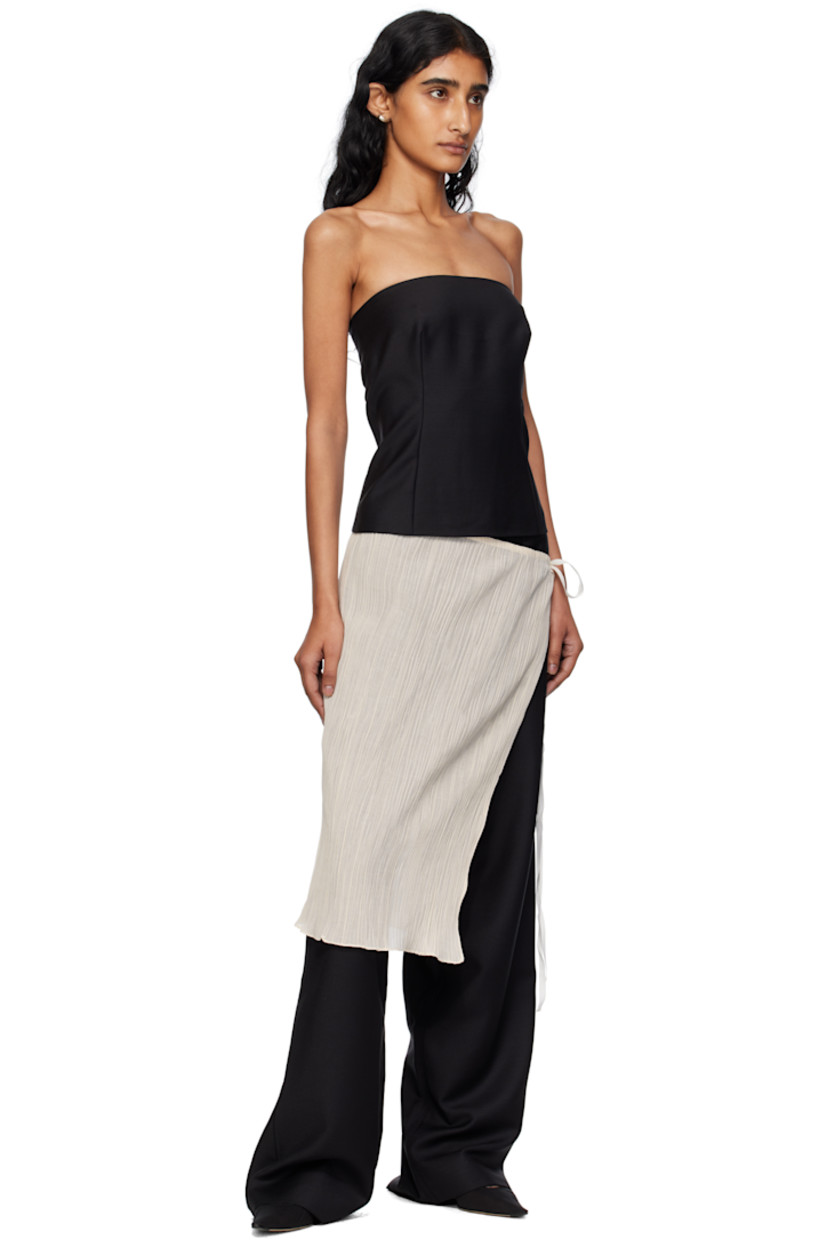 Plain-woven wool- and mohair-blend bustier-style top. 

· Strapless construction
· Straight neck
· Darts at front and back
· Concealed zip closure at side seam
· Full silk satin lining

Supplier color: Black