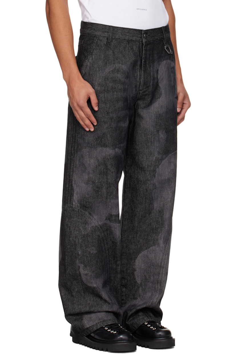 Oil-washed non-stretch denim jeans.

· Garment-dyed
· Laser-engraved graphics throughout 
· Wide-leg 
· Belt loops
· Four-pocket styling
· Zip fly 
· Logo-engraved carabiner at front waist

Supplier color: Black