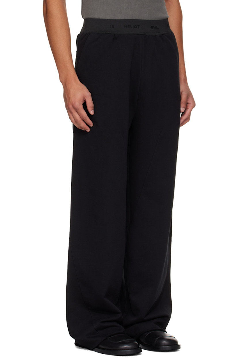 French terry sweatpants.

· Loose-fit
· Jacquard logo at elasticized waistband
· Four-pocket styling
· Raw edge at cuffs

Supplier color: Black