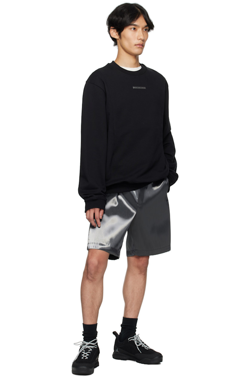 French terry sweatshirt.

· Rib-knit crewneck, hem, and cuffs
· Logo plaque at chest
· Darts at front

Supplier color: Cotton black