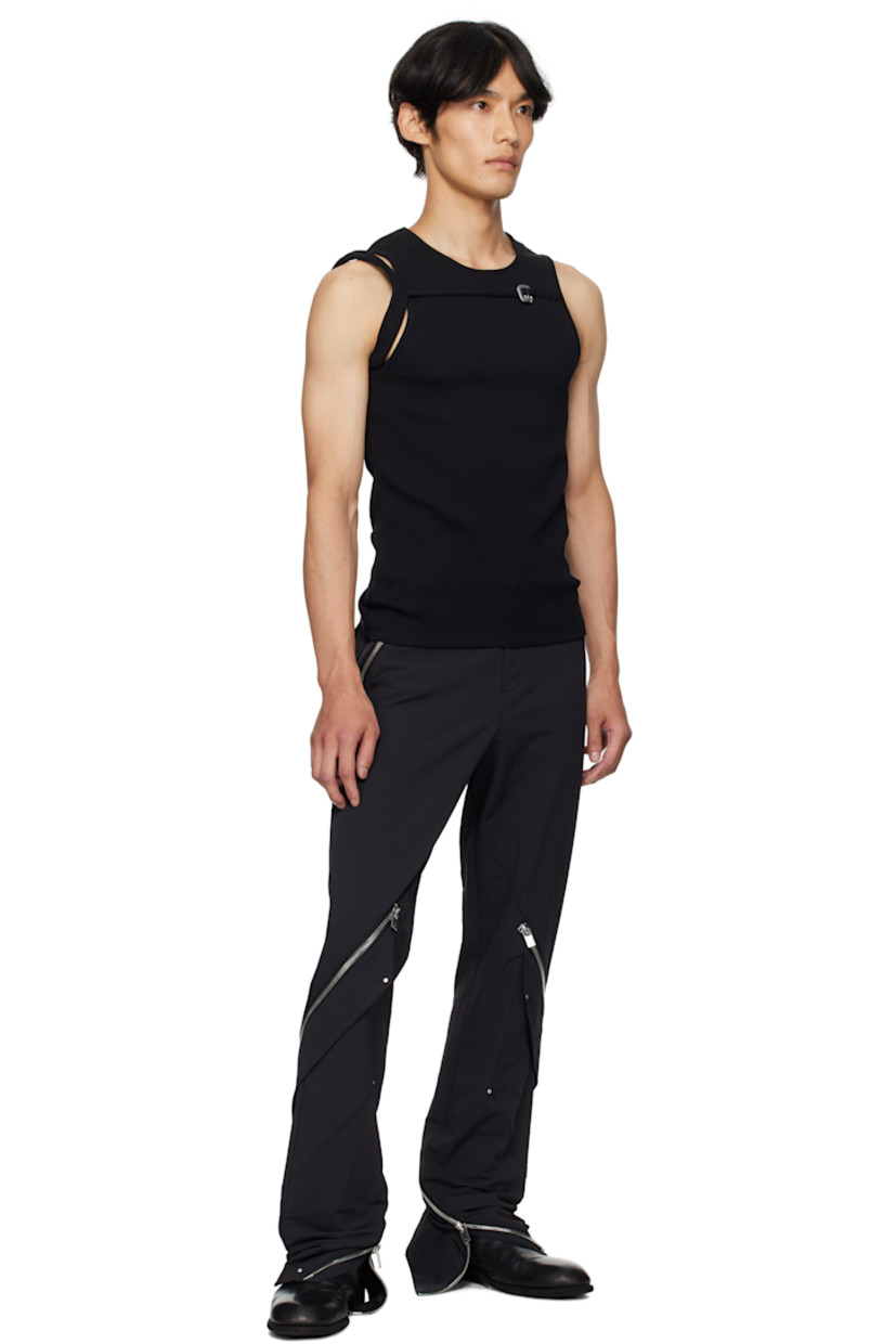 Rib-knit cotton tank top.

· Crewneck
· Adjustable hook-eye strap at chest
· Cutout at armscye

Supplier color: Black