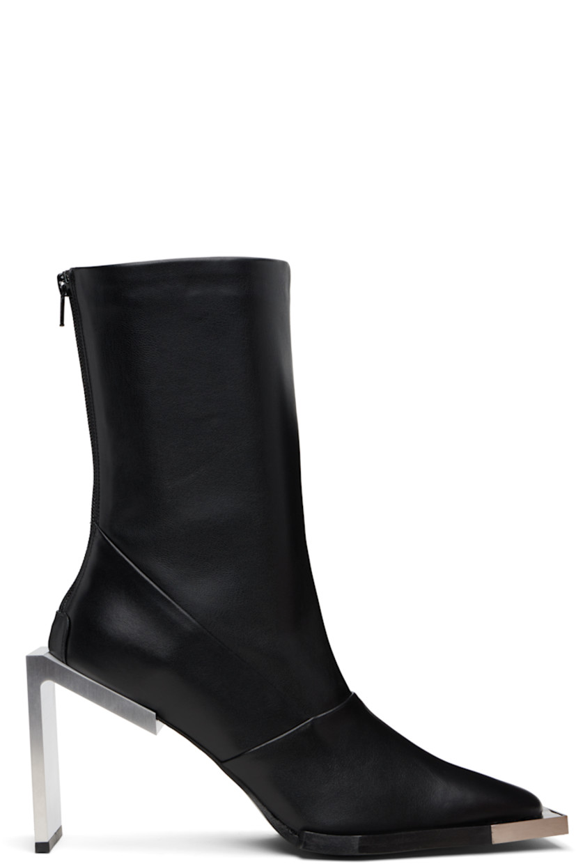 Handcrafted ankle-high buffed calfskin boots.

· Logo plaque at square toe
· Zip closure at heel 
· Bonded jersey lining
· Brushed stainless steel heel with rubber injection
· Leather sole
· Heel: H4" 

Supplier color: Black