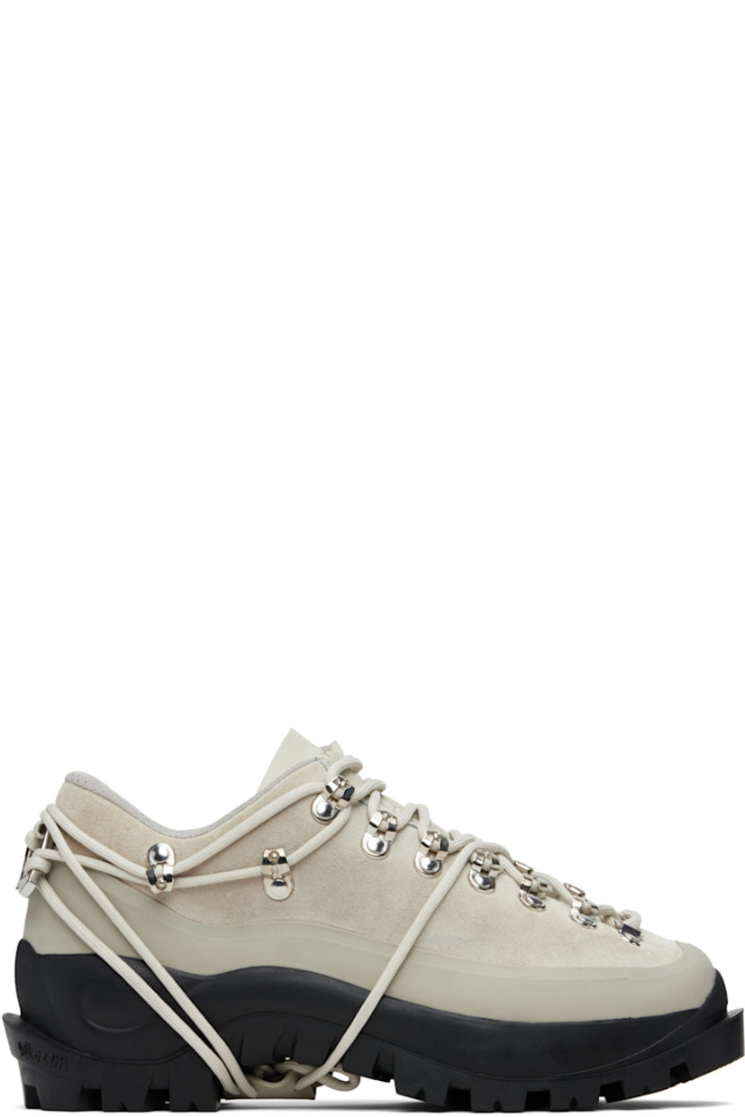 Low-top suede boots.

· Lace-up detailing throughout
· Lace-up closure
· Logo embossed at padded tongue
· Padded collar
· Carabiner-style clasp at heel tab
· Mesh lining
· Rubber trim at welt
· Treaded Vibram® rubber platform sole
· Platform: H1.75"

Supplier color: Stone