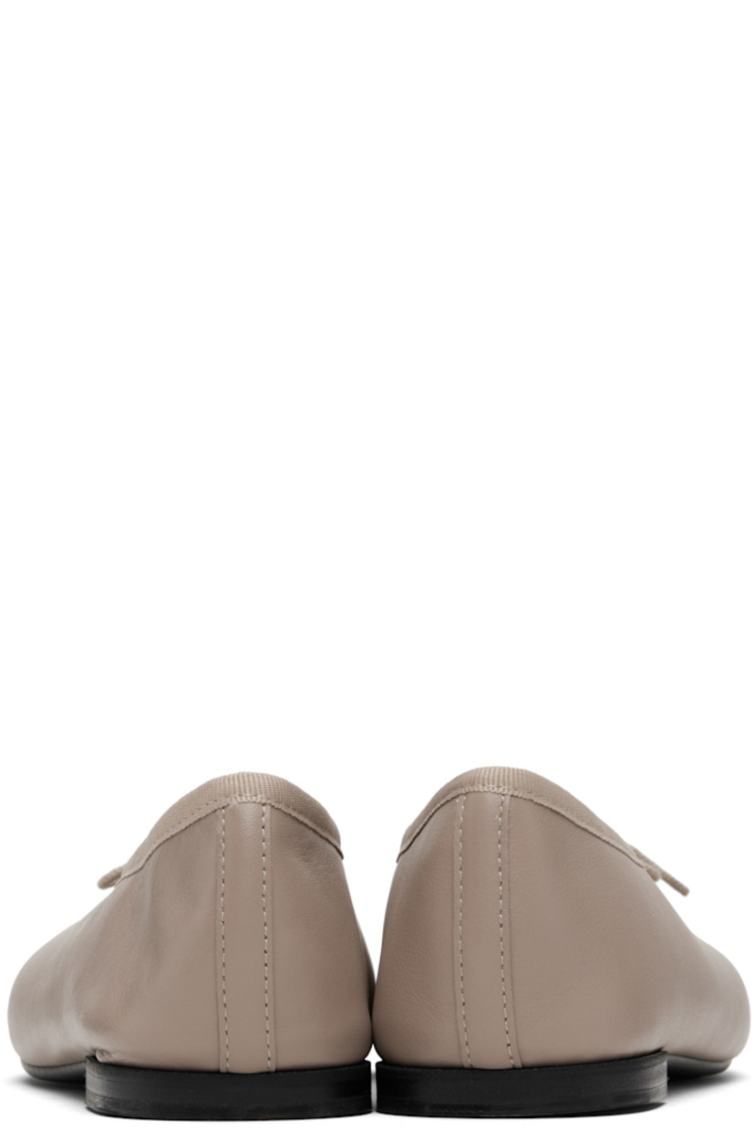 Grained leather ballerina flats.

· Almond toe
· Bow accent at vamp
· Grosgrain trim at collar
· Twill lining
· Stacked leather heel with rubber injection
· Rubber sole

Supplier color: Beige taupe