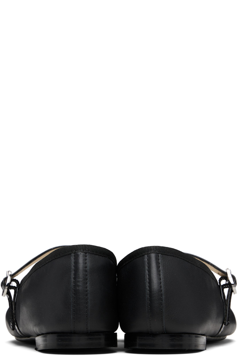 Grained and patent leather Mary Jane-style ballerina flats.

· Square cap toe
· Pin-buckle strap at vamp
· Grosgrain trim at collar
· Cotton twill lining
· Stacked leather heel with rubber injection
· Treaded rubber sole

Supplier color: Black