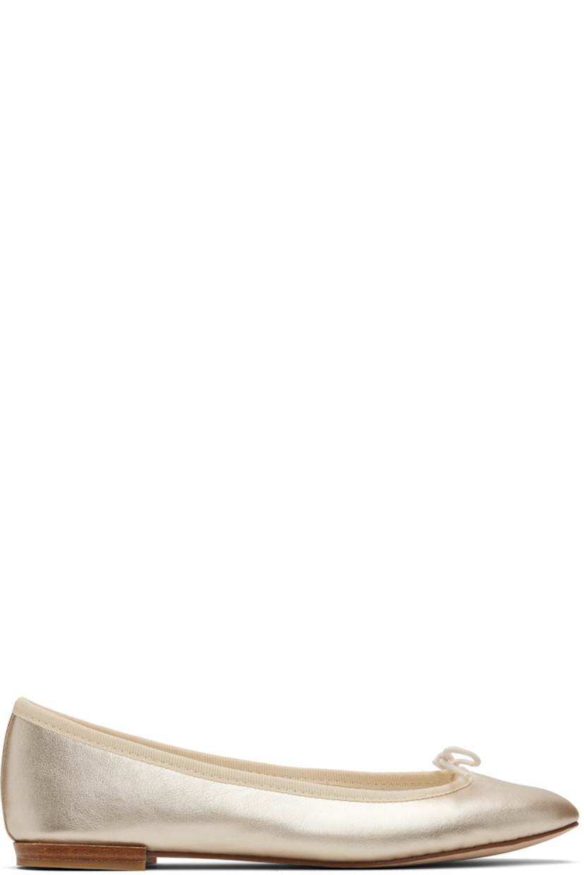 Grained lambskin ballerina flats.

· Bow accent at vamp
· Grosgrain trim at collar
· Twill lining
· Stacked leather heel with rubber injection
· Leather sole

Supplier color: Light gold