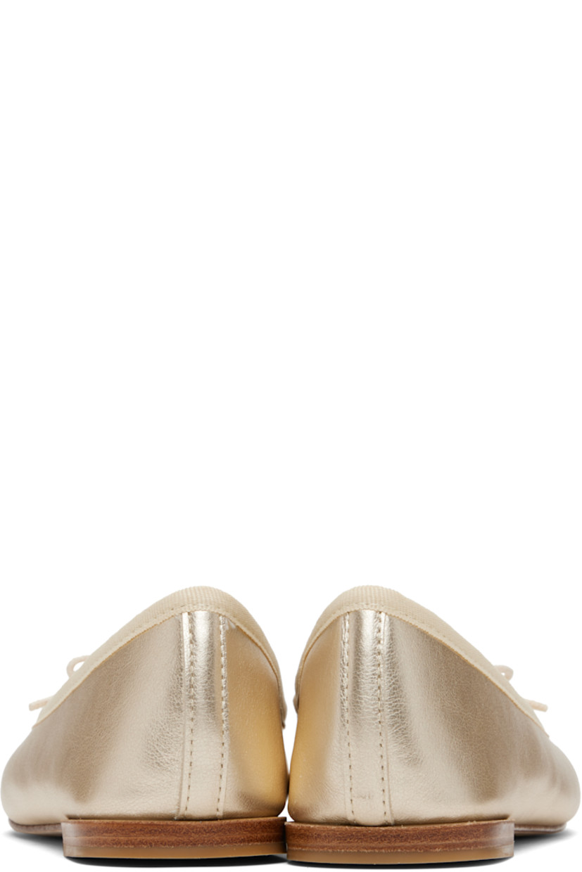 Grained lambskin ballerina flats.

· Bow accent at vamp
· Grosgrain trim at collar
· Twill lining
· Stacked leather heel with rubber injection
· Leather sole

Supplier color: Light gold