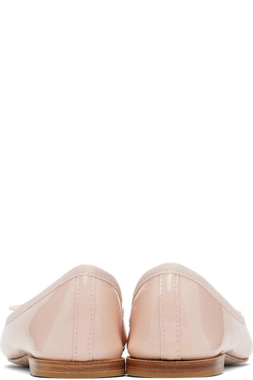 Patent leather ballerina flats.

· Bow accent and grosgrain trim at collar
· Plain-woven lining
· Stacked leather heel with rubber injection
· Rubber sole

Supplier color: Icon pink