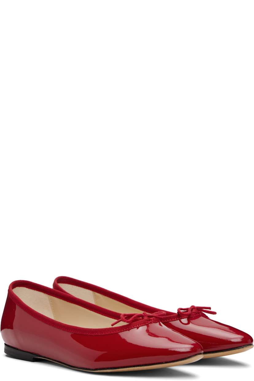 Patent lambskin ballerina flats.

· Pointed toe
· Bow accent and grosgrain trim at collar
· Plain-woven lining
· Stacked leather heel with rubber injection
· Rubber sole

Supplier color: Flame red