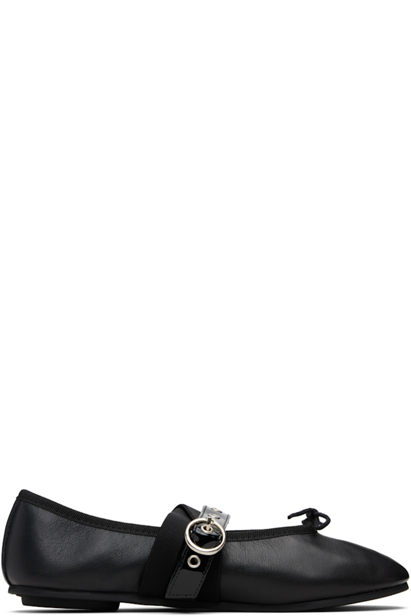 Buffed and patent leather ballerina flats.

�· Bow accent and grosgrain trim at collar
· Pin-buckle and elasticized crisscrossing straps at vamp
· Cotton twill lining
· Rubber sole

Supplier color: Black