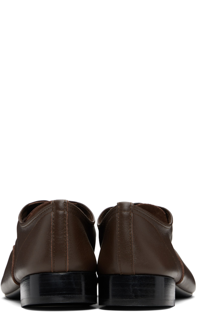 Grained nappa calfskin oxfords.

· Lace-up closure
· Partial suede lining
· Stacked leather heel with rubber injection
· Nubuck sole
· Heel: H1.25"

Supplier color: Ristretto brown