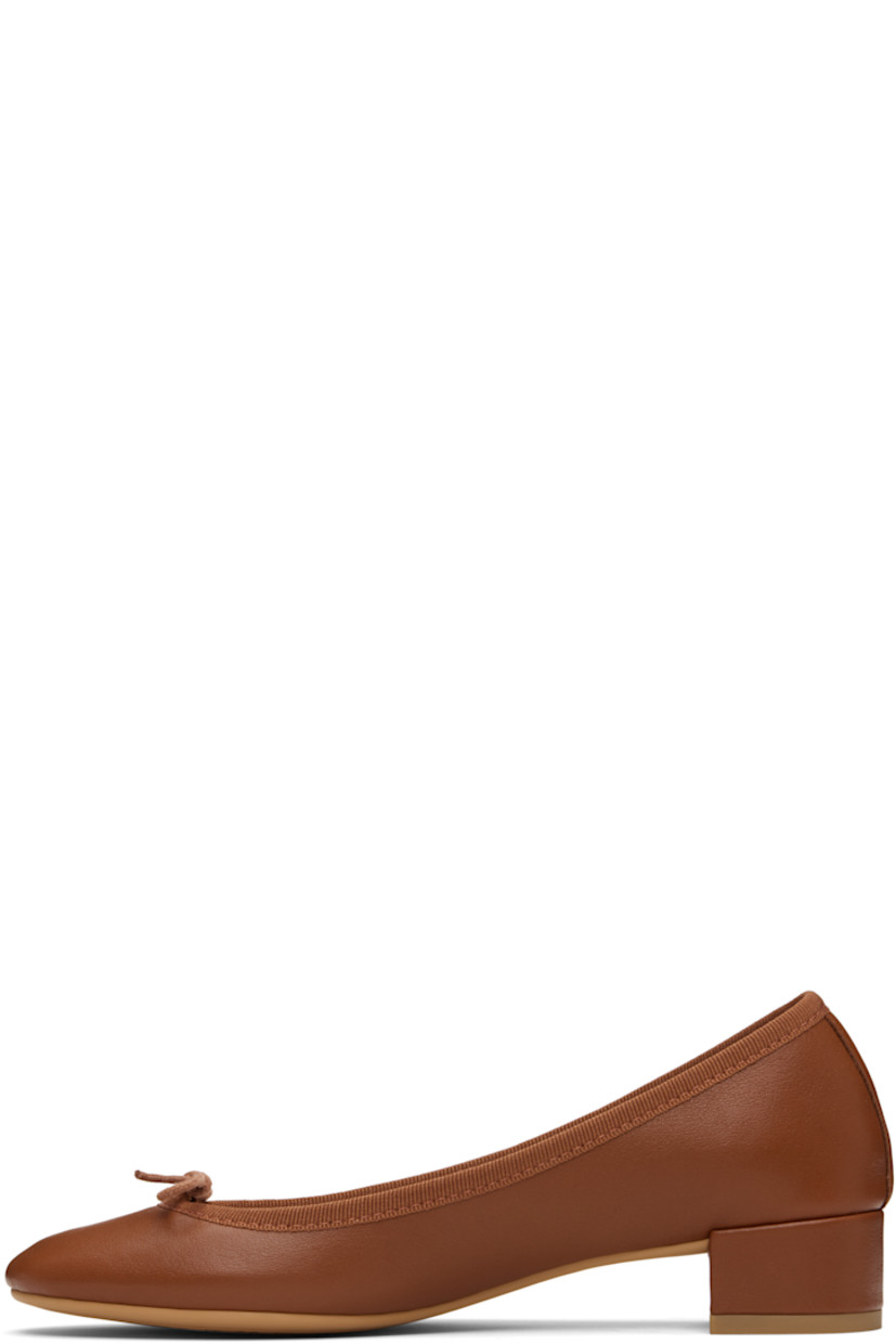 Grained nappa calfskin heels.

· Bow accent at vamp
· Grosgrain trim at collar
· Covered block heel
· Treaded rubber sole
· Heel: H1.25"

Supplier color: Cinnamon
