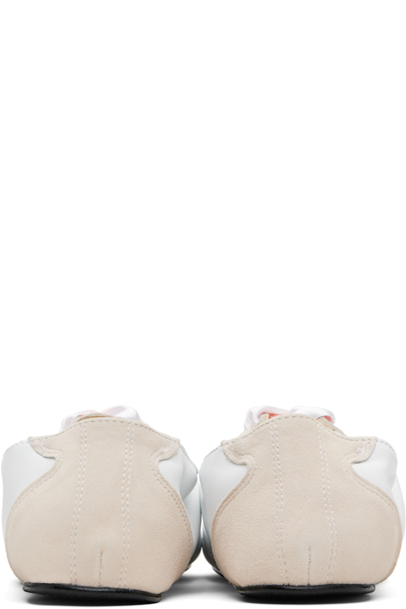 Low-top grained sheepskin and goatskin suede sneakers.

· Satin lace-up closure
· Logo patch at tongue
· Elasticized collar
· Buffed lambskin lining
· Crêpe rubber sole

Supplier color: White