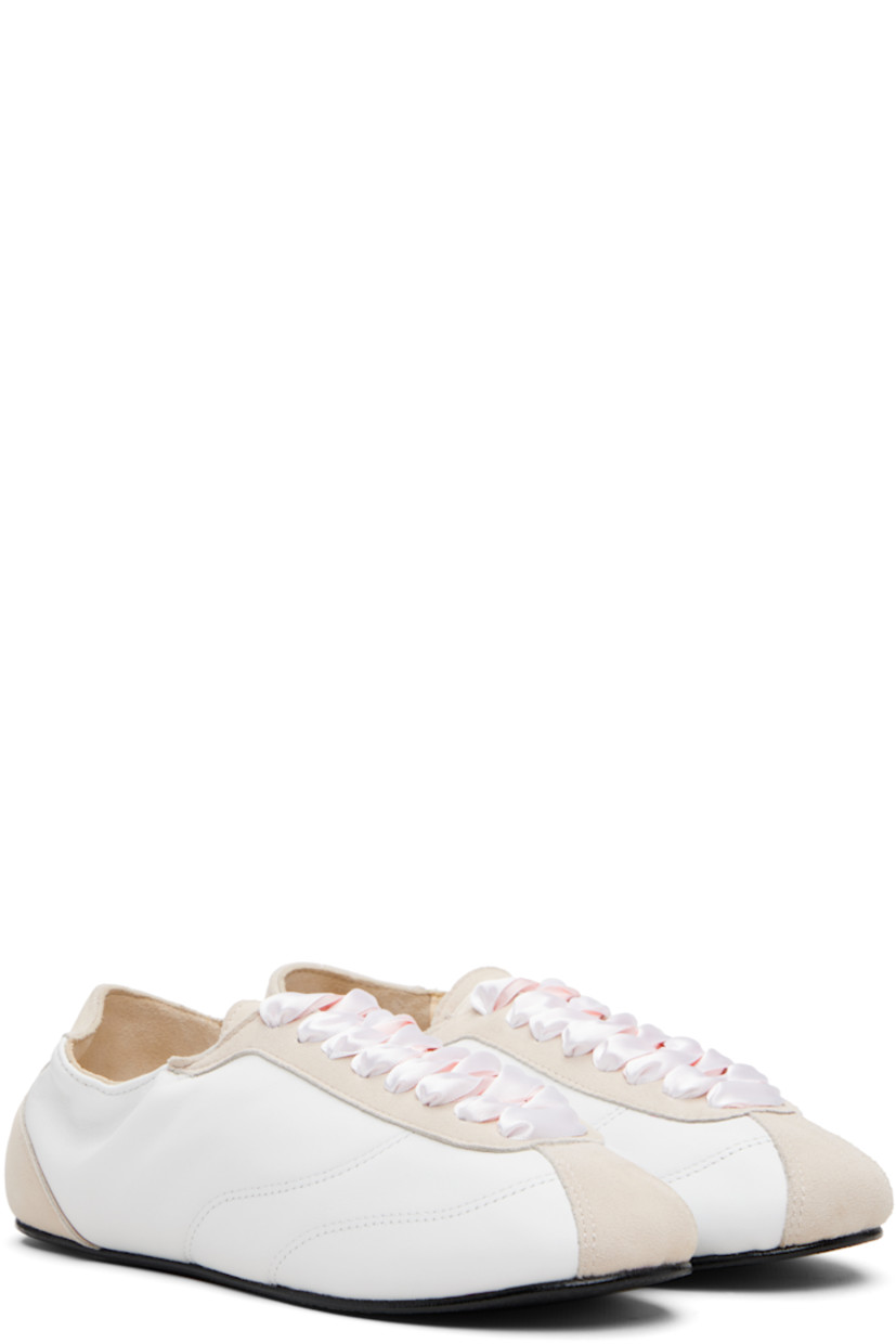 Low-top grained sheepskin and goatskin suede sneakers.

· Satin lace-up closure
· Logo patch at tongue
· Elasticized collar
· Buffed lambskin lining
· Crêpe rubber sole

Supplier color: White
