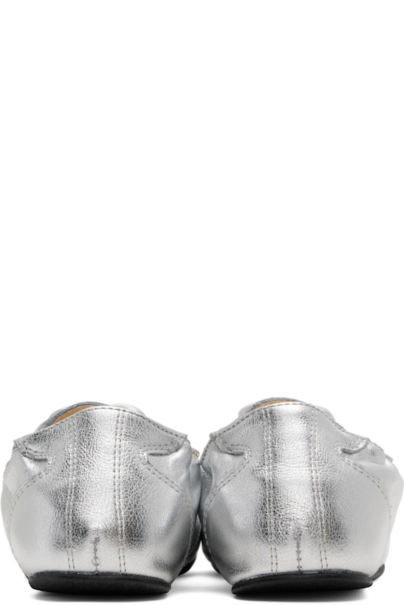 Low-top grained leather sneakers.

· Satin lace-up closure
· Logo patch at tongue
· Elasticized collar
· Buffed lambskin lining
· Crêpe rubber sole

Supplier color: Silver