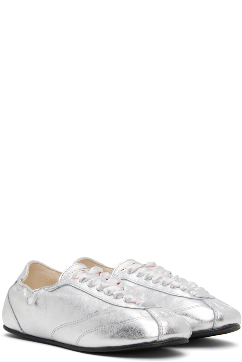 Low-top grained leather sneakers.

· Satin lace-up closure
· Logo patch at tongue
· Elasticized collar
· Buffed lambskin lining
· Crêpe rubber sole

Supplier color: Silver