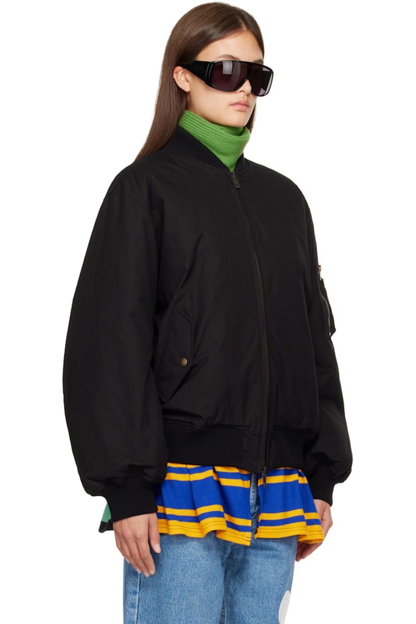 Insulated cotton broadcloth jacket.

· Rib-knit stand collar, hem, and cuffs
· Two-way zip closure
· Flap pockets at front
· Striped knit trim at hem
· Full satin lining

Each item is unique. Please note finishings may vary.

Supplier color: Black