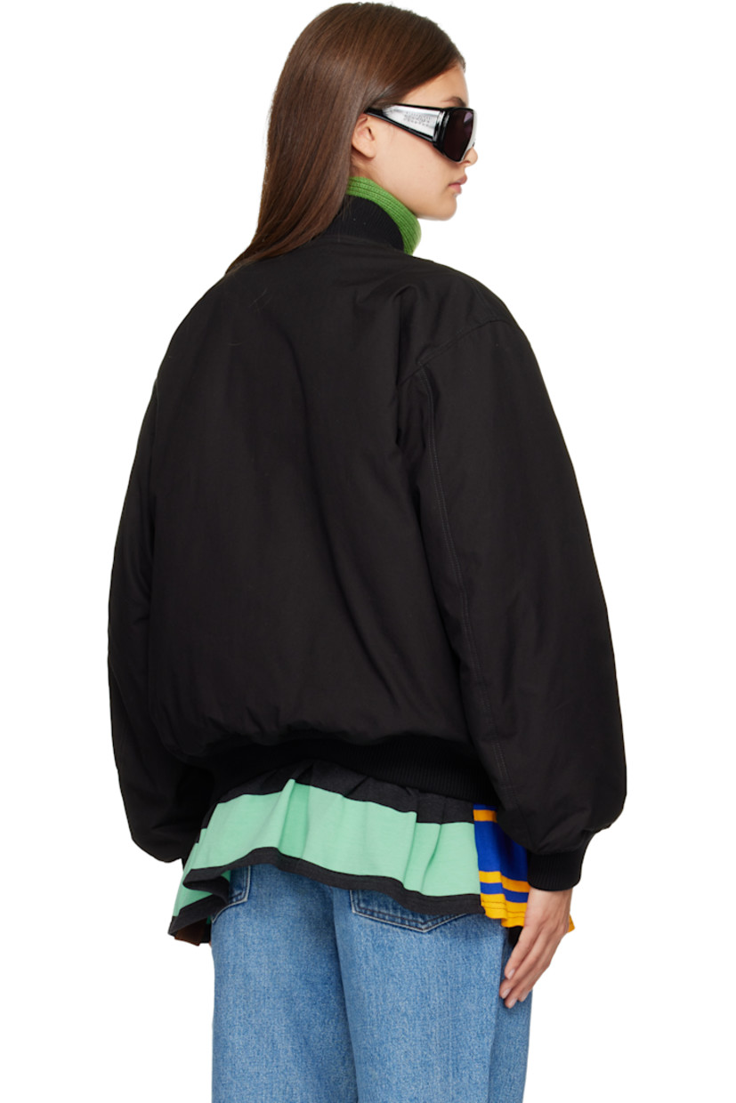Insulated cotton broadcloth jacket.

· Rib-knit stand collar, hem, and cuffs
· Two-way zip closure
· Flap pockets at front
· Striped knit trim at hem
· Full satin lining

Each item is unique. Please note finishings may vary.

Supplier color: Black