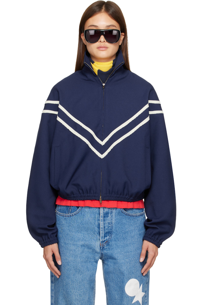 Twill jacket.

· Scalloped trim throughout
· Stand collar
· Two-way zip closure
· Welt pockets at front
· Elasticized hem and cuffs
· Full satin lining

Supplier color: Navy