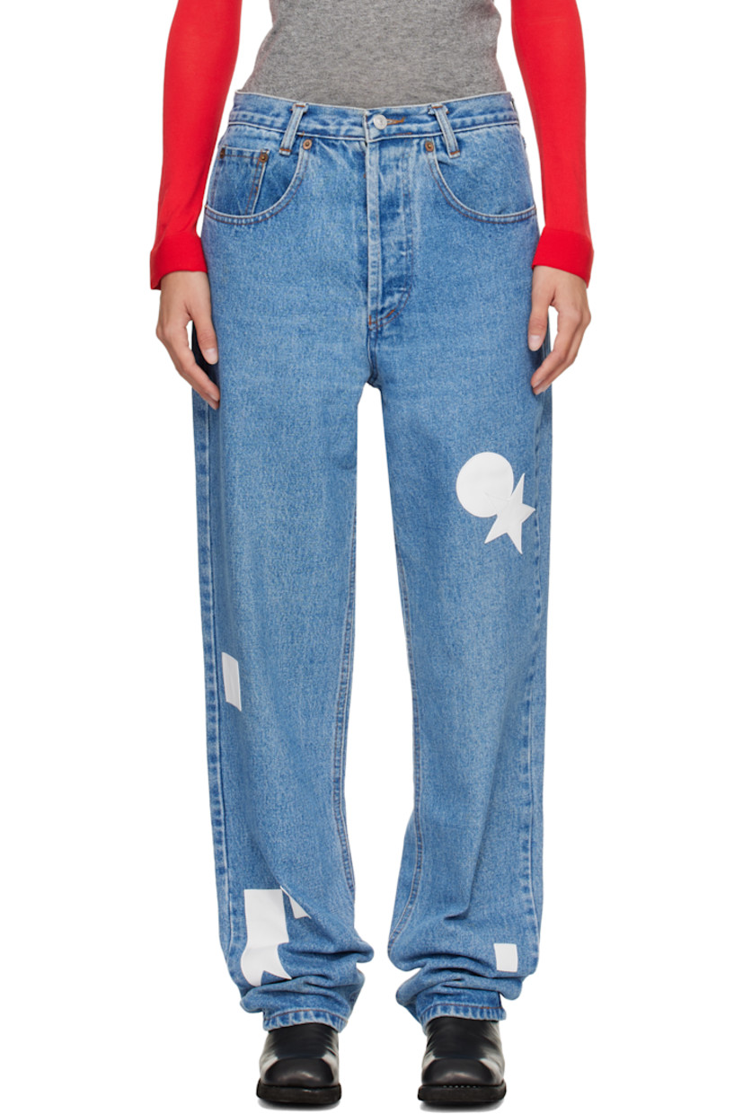 Non-stretch denim jeans.

· Fading and whiskering throughout
· Belt loops
· Five-pocket styling
· Button fly
· Hand-stitched leather graphic patches at legs

Each item is unique. Please note finishings may vary.

Supplier color: Blue/White