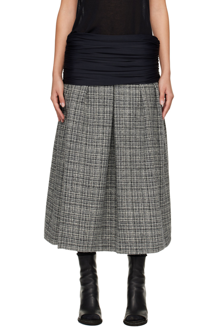 Wool tweed midi skirt.

· Check pattern throughout
· Draping at elasticized foldover waistband
· Ruching at side seams
· Hook-eye and zip closure at side seam
· Full satin lining

Supplier color: Tweed