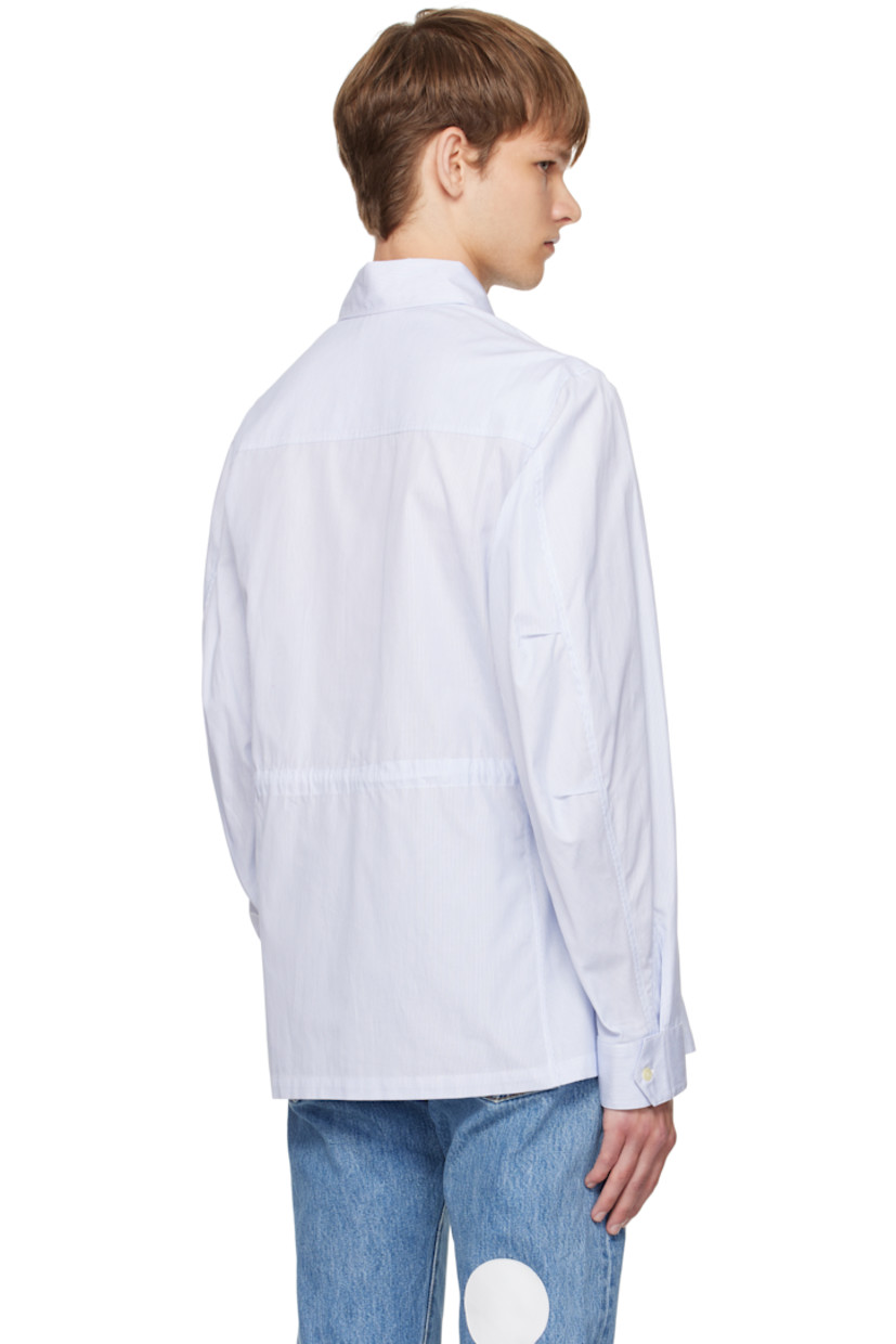 Cotton oxford cloth shirt. 

· Pinstripes throughout 
· Spread collar 
· Button closure
· Buttoned barrel cuffs
· Logo embroidered at cuff
· Self-tie drawstring at interior waist 

Supplier color: Blue pinstripe