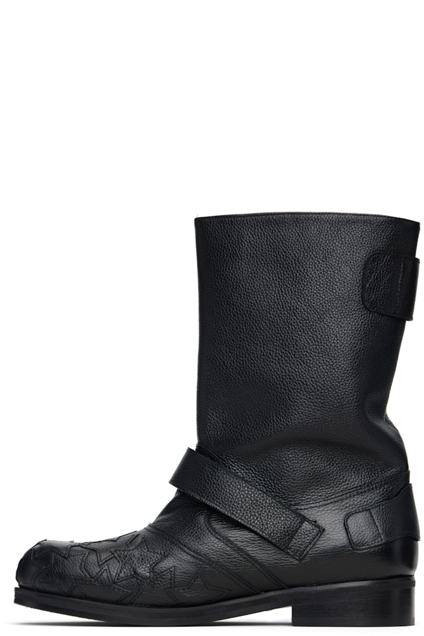 Mid-calf pebble-grained leather boots.

· Graphic appliqués at vamp
· Pin-buckle straps at outer side and collar
· Buffed leather lining
· Stacked leather heel with rubber injection
· Leather sole

Supplier color: Black