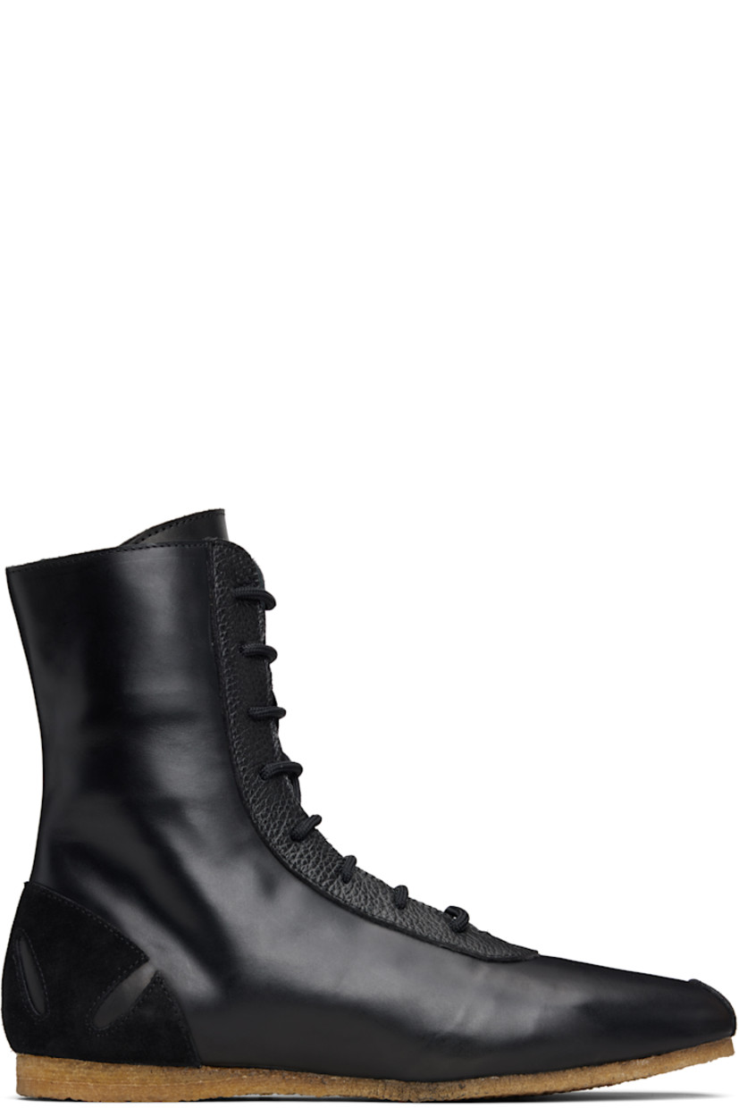 High-top suede and buffed leather sneakers.

· Square toe
· Lace-up closure
· Zip closure at inner side
· Graphic cutouts at heel counter
· Buffed leather lining
· Crêpe-rubber sole

Supplier color: Black/Black