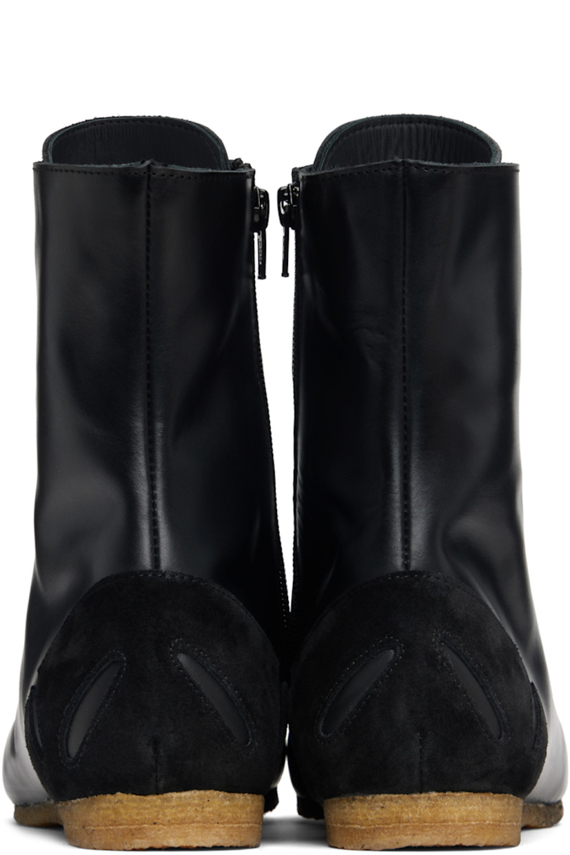 High-top suede and buffed leather sneakers.

· Square toe
· Lace-up closure
· Zip closure at inner side
· Graphic cutouts at heel counter
· Buffed leather lining
· Crêpe-rubber sole

Supplier color: Black/Black
