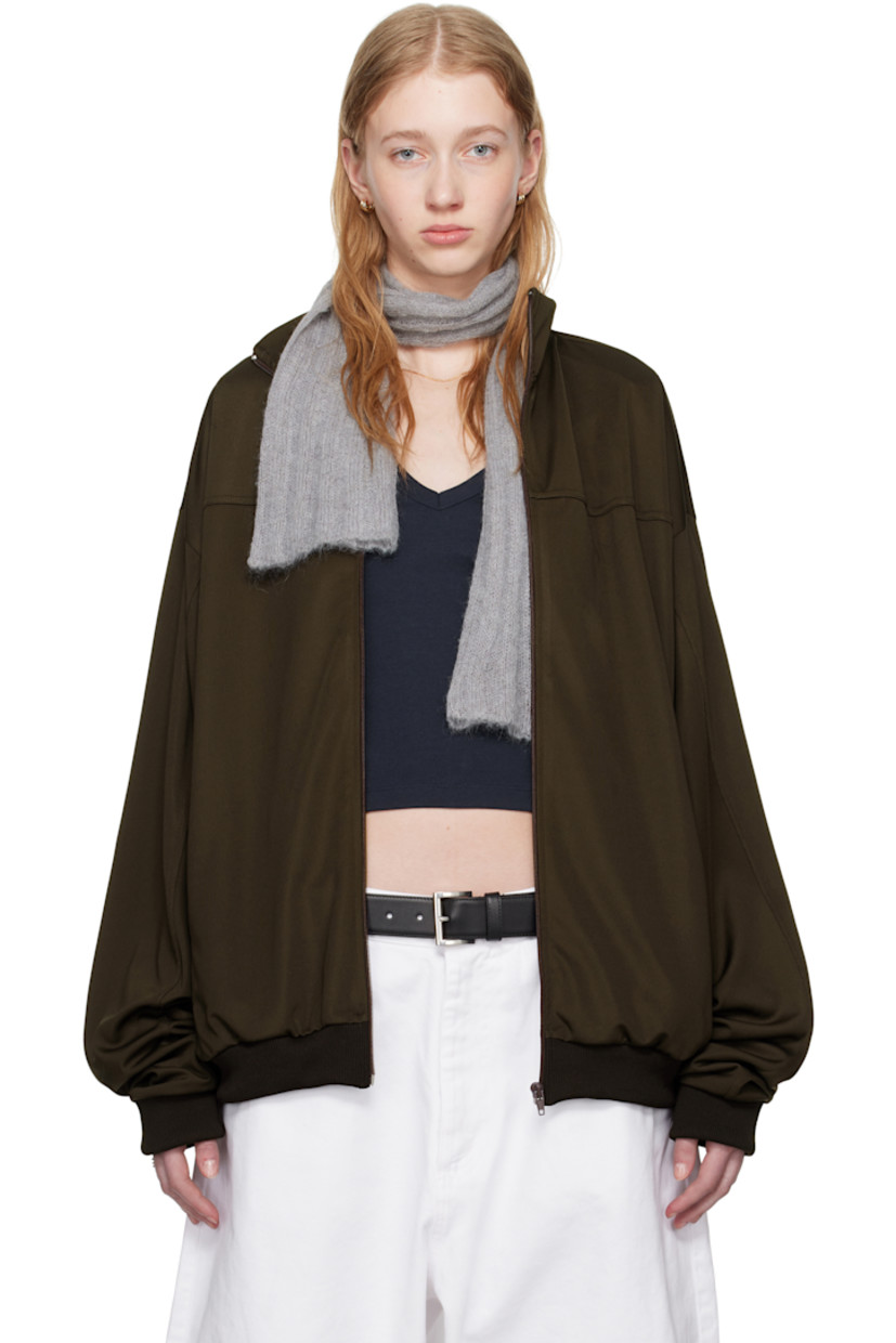 Stretch jersey track jacket.

· Stand collar
· Zip closure
· Logo embroidered at chest
· Welt pockets at waist
· Rib-knit hem and cuffs

Supplier color: Turkish Coffee