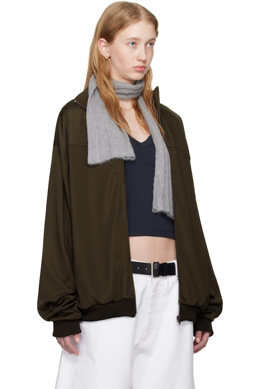 Stretch jersey track jacket.

· Stand collar
· Zip closure
· Logo embroidered at chest
· Welt pockets at waist
· Rib-knit hem and cuffs

Supplier color: Turkish Coffee