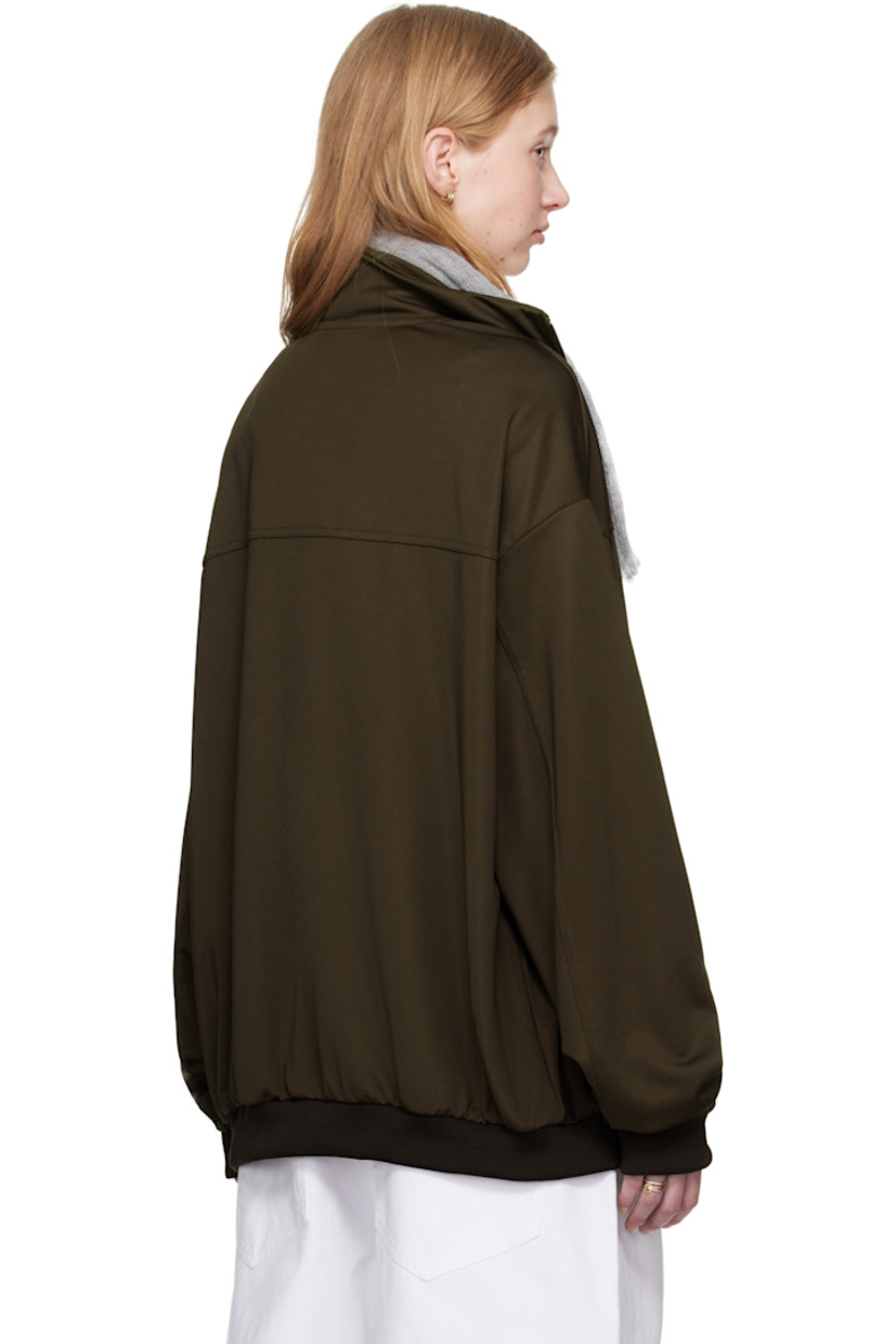 Stretch jersey track jacket.

· Stand collar
· Zip closure
· Logo embroidered at chest
· Welt pockets at waist
· Rib-knit hem and cuffs

Supplier color: Turkish Coffee