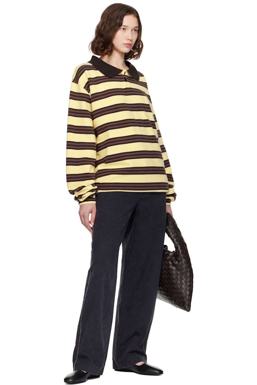 Stretch cotton jersey polo.

· Stripes throughout
· Rib-knit spread collar
· Short two-button placket
· Dropped shoulders

Supplier color: Turkish Coffee Stripe