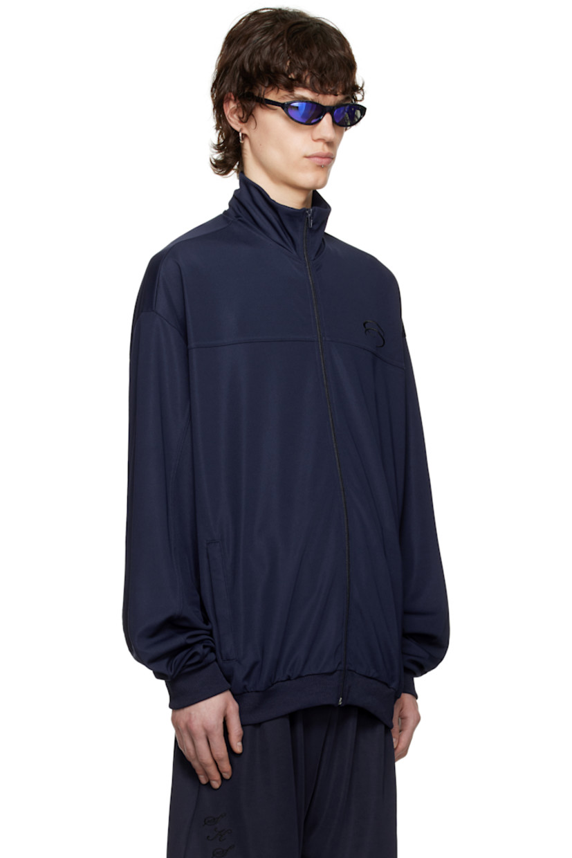 Stretch jersey track jacket.

· Stand collar
· Zip closure
· Logo embroidered at chest
· Welt pockets at waist
· Rib-knit hem and cuffs

Supplier color: Navy