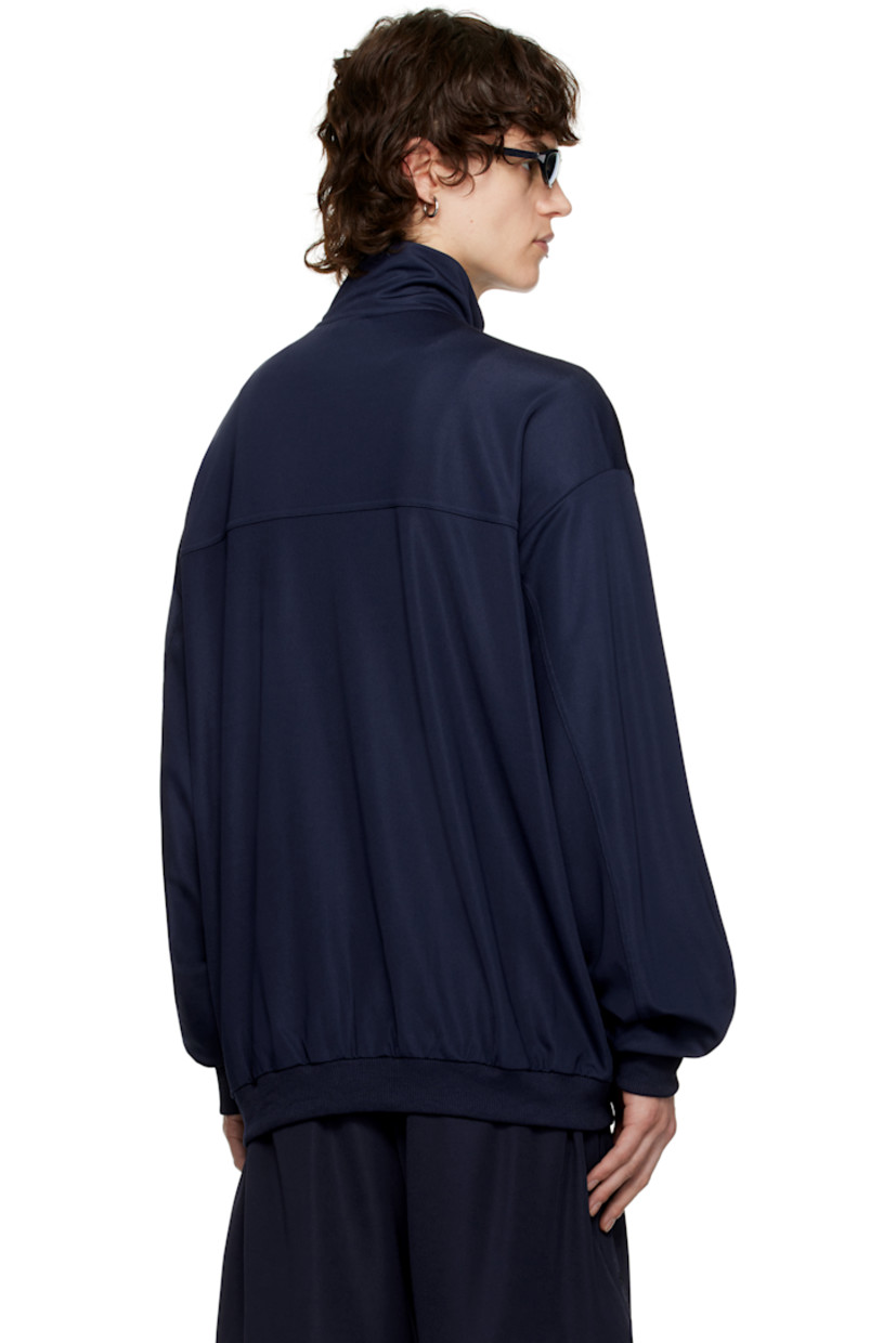 Stretch jersey track jacket.

· Stand collar
· Zip closure
· Logo embroidered at chest
· Welt pockets at waist
· Rib-knit hem and cuffs

Supplier color: Navy