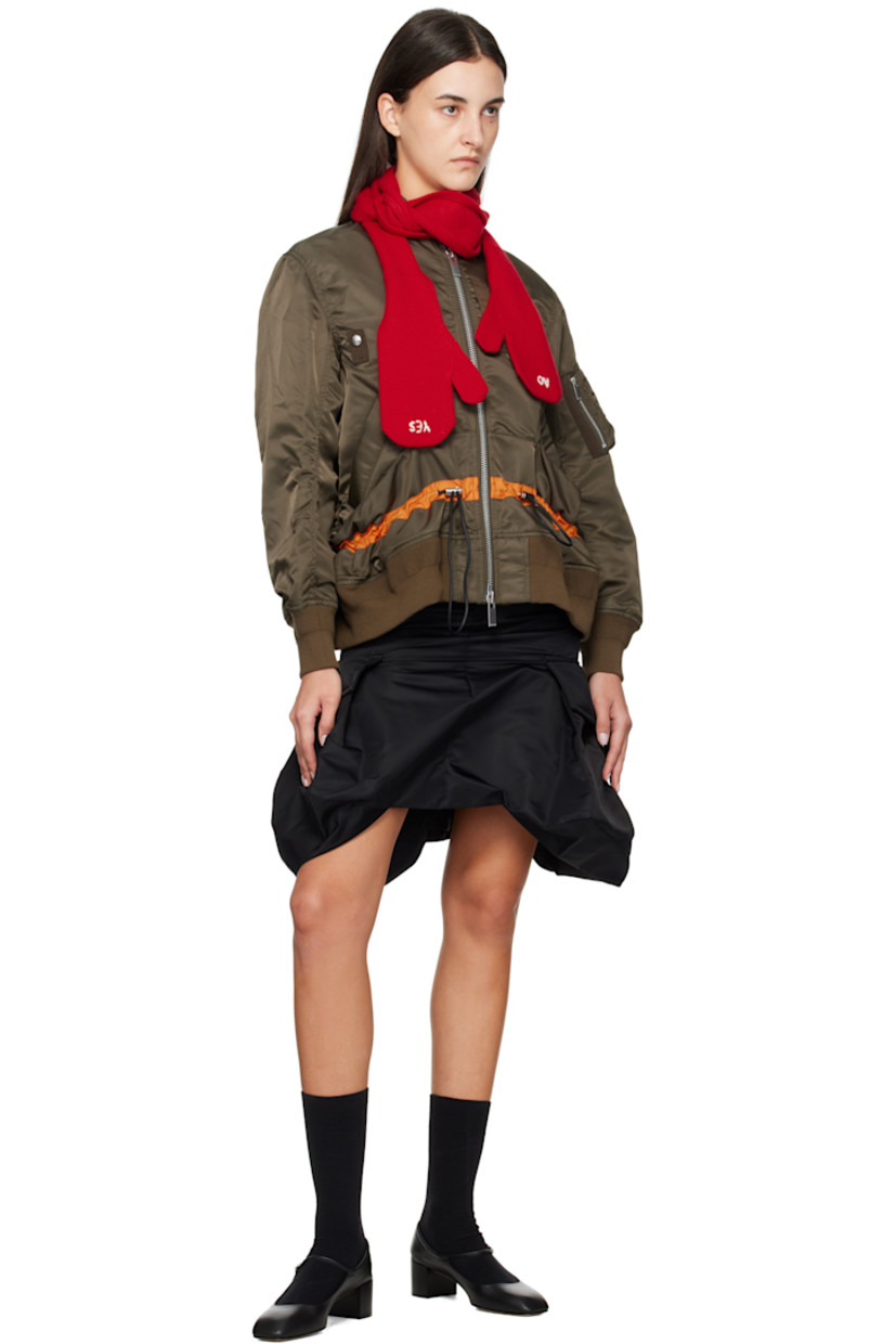 Pair of knit wool gloves.

· Integrated scarf
· Logo embroidered at top

Supplier color: Red