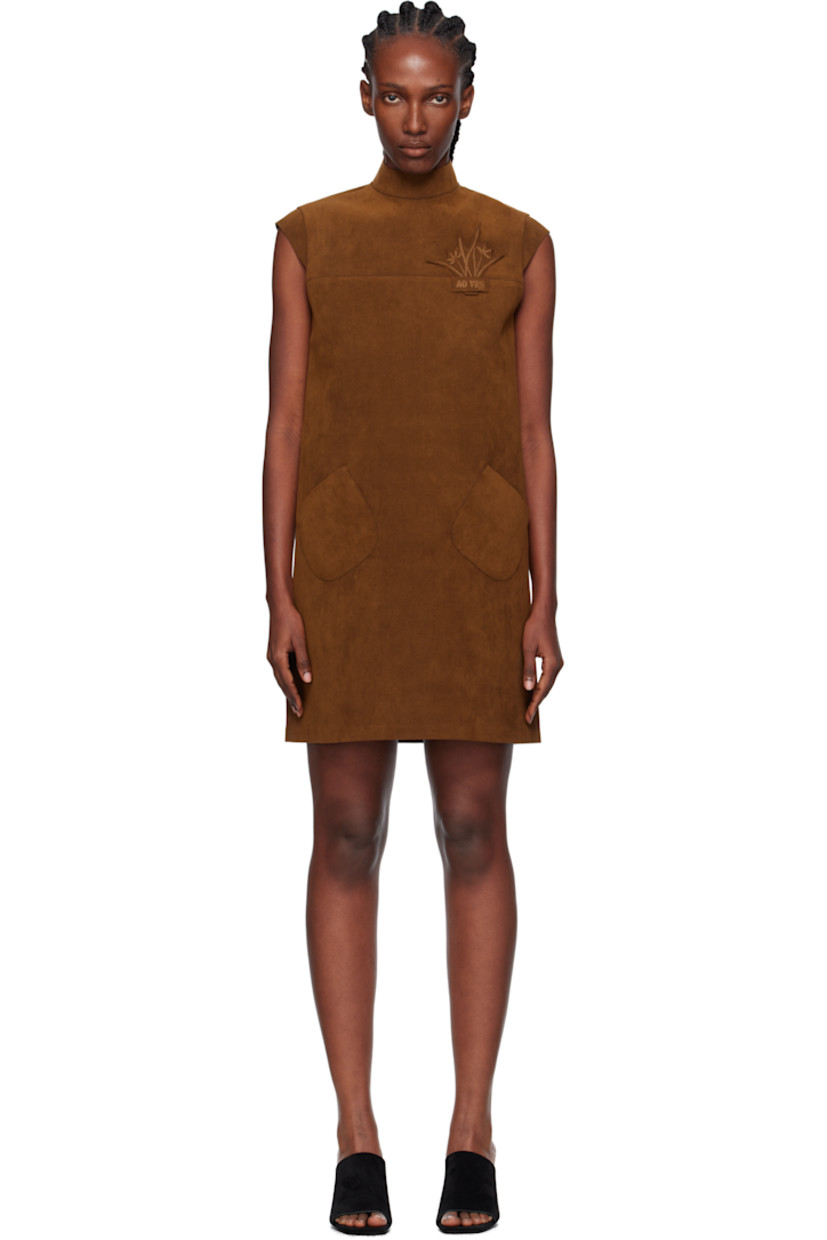 Faux-suede minidress.

· Stand collar
· Graphic and logo appliqué at chest
· Patch pockets at front
· Cap sleeves
· Zip closure at back

Supplier color: Brown