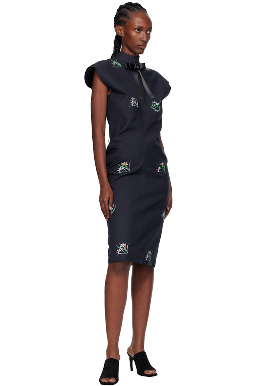 Wool-blend twill midi dress.

· Floral graphics and logo embroidered throughout
· Detachable bow at stand collar
· Zip closure at back
· Central vent at back hem
· Full satin lining

Supplier color: Navy
