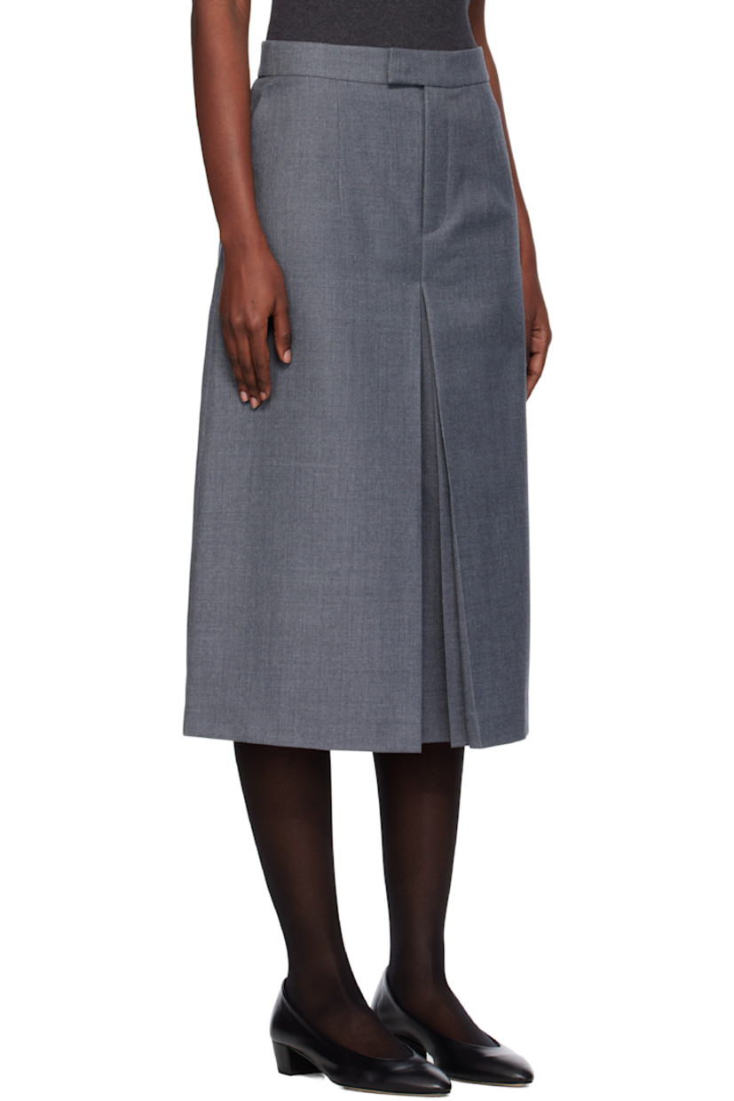 Wool-blend twill trousers.

· Four-pocket styling
· Zip fly
· Pleats at inseams
· Cropped legs

Supplier color: Grey